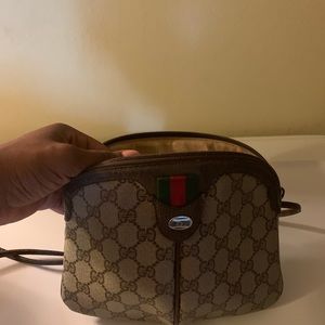 Gucci cross bag.